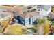 Aerial view showcasing the backyard and a detached shed at 12956 E 107Th Pl, Commerce City, CO 80022