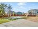 Large backyard with grassy area, partially covered in snow at 12956 E 107Th Pl, Commerce City, CO 80022