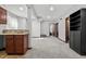 Finished basement features a kitchenette, bathroom and large rec room at 12956 E 107Th Pl, Commerce City, CO 80022