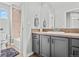 Bathroom with tub, shower, and gray vanity at 12956 E 107Th Pl, Commerce City, CO 80022
