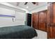 Basement bedroom with baseball theme and built-in shelves at 12956 E 107Th Pl, Commerce City, CO 80022