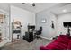 Home office with a workspace and home gym at 12956 E 107Th Pl, Commerce City, CO 80022