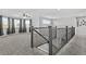 Spacious loft area with carpet and a view to the lower level at 12956 E 107Th Pl, Commerce City, CO 80022