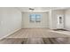 Bright living room with carpeted floor and neutral wall colors at 3036 Oxley St, Strasburg, CO 80136