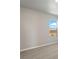 Bedroom with large window offering scenic views at 3036 Oxley St, Strasburg, CO 80136