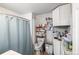 Bathroom with shower/tub combo and ample storage at 7225 Newton St, Westminster, CO 80030