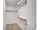 Large walk-in closet with hanging rods and shelves at 7870 W 87Th Dr # J, Arvada, CO 80005