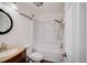 Clean bathroom featuring a tub, shower, and updated vanity at 7870 W 87Th Dr # J, Arvada, CO 80005