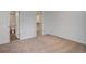 Spacious bedroom with carpet flooring and access to bathroom and closet at 7870 W 87Th Dr # J, Arvada, CO 80005