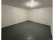 Finished basement room with gray flooring and neutral walls at 2084 S Rifle St, Aurora, CO 80013