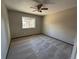 Spacious bedroom with a large closet and ceiling fan at 2084 S Rifle St, Aurora, CO 80013