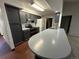 Kitchen features dark grey cabinets and a large island at 2084 S Rifle St, Aurora, CO 80013