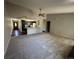 Open concept living room with a view into the kitchen at 2084 S Rifle St, Aurora, CO 80013
