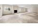 Unfinished basement with high ceilings and fireplace at 4800 E Cedar Ave, Denver, CO 80246