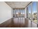 Bright living room with hardwood floors and city views at 891 14Th St # 3108, Denver, CO 80202