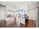 Modern kitchen with island and hardwood floors at 891 14Th St # 3108, Denver, CO 80202