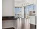 Open living area with hardwood floors and expansive windows at 891 14Th St # 3108, Denver, CO 80202