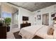 Main bedroom with city views and ensuite bathroom access at 891 14Th St # 3108, Denver, CO 80202