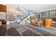 Lobby with seating, shelves, and modern staircase at 891 14Th St # 3108, Denver, CO 80202