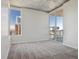 Bright bedroom with city views and access to a private balcony at 891 14Th St # 3108, Denver, CO 80202