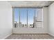 Bright bedroom with large windows and city views at 891 14Th St # 3108, Denver, CO 80202