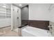 Spa-like bathroom with soaking tub, glass shower, and ample storage at 891 14Th St # 3108, Denver, CO 80202