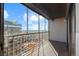 Spacious balcony with glass enclosure and city views at 777 N Washington St # 1203, Denver, CO 80203