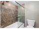 Bathroom with shower/tub combo and updated tile at 777 N Washington St # 1203, Denver, CO 80203