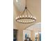 Elegant chandelier in entryway at 12963 Silver Elk Ln, Littleton, CO 80127