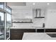 Modern kitchen with marble backsplash and stainless steel appliances at 1700 Bassett St # 1901, Denver, CO 80202