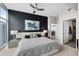 Main bedroom with ensuite bathroom access and city views at 1700 Bassett St # 1901, Denver, CO 80202