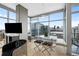Modern dining area with glass table and city views at 1700 Bassett St # 1901, Denver, CO 80202