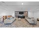 Relaxing community lounge with plush sofas and a large TV at 1700 Bassett St # 1901, Denver, CO 80202