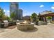 Outdoor patio with fire pit and grills at 1700 Bassett St # 1901, Denver, CO 80202
