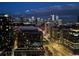 Nighttime aerial view of city skyline with bright lights at 1700 Bassett St # 1901, Denver, CO 80202