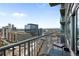 Balcony with city views and seating area at 1700 Bassett St # 1901, Denver, CO 80202
