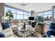 Spacious living room with city views and modern furnishings at 1700 Bassett St # 1901, Denver, CO 80202