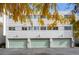 Three-unit building with attached garages at 2362 S Troy St, Aurora, CO 80014