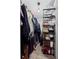 Walk-in closet with shelving and hanging rods at 2362 S Troy St, Aurora, CO 80014