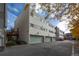 Three-unit building with attached garages and deck at 2362 S Troy St, Aurora, CO 80014