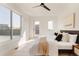 Bright bedroom with large windows and plush bedding at 16113 W 14Th Ave, Golden, CO 80401