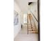 Modern staircase with light wood and metal accents at 16113 W 14Th Ave, Golden, CO 80401