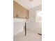 Laundry room with built-in cabinets and folding counter at 16113 W 14Th Ave, Golden, CO 80401