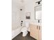 Clean bathroom with a tub, toilet and vanity at 16113 W 14Th Ave, Golden, CO 80401