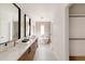 Elegant bathroom with double vanity and walk-in shower at 16113 W 14Th Ave, Golden, CO 80401