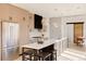 Modern kitchen with stainless steel appliances and breakfast bar at 16113 W 14Th Ave, Golden, CO 80401