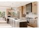 Modern kitchen boasts stainless steel appliances and large island at 16113 W 14Th Ave, Golden, CO 80401