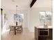 Elegant dining room with wood table and modern chandelier at 16113 W 14Th Ave, Golden, CO 80401