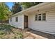 Side view of a ranch style home with landscaping at 577 96Th St, Louisville, CO 80027