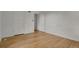 Hardwood floor bedroom with access to another room and closet at 577 96Th St, Louisville, CO 80027